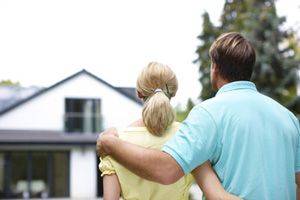 Couple looking at house